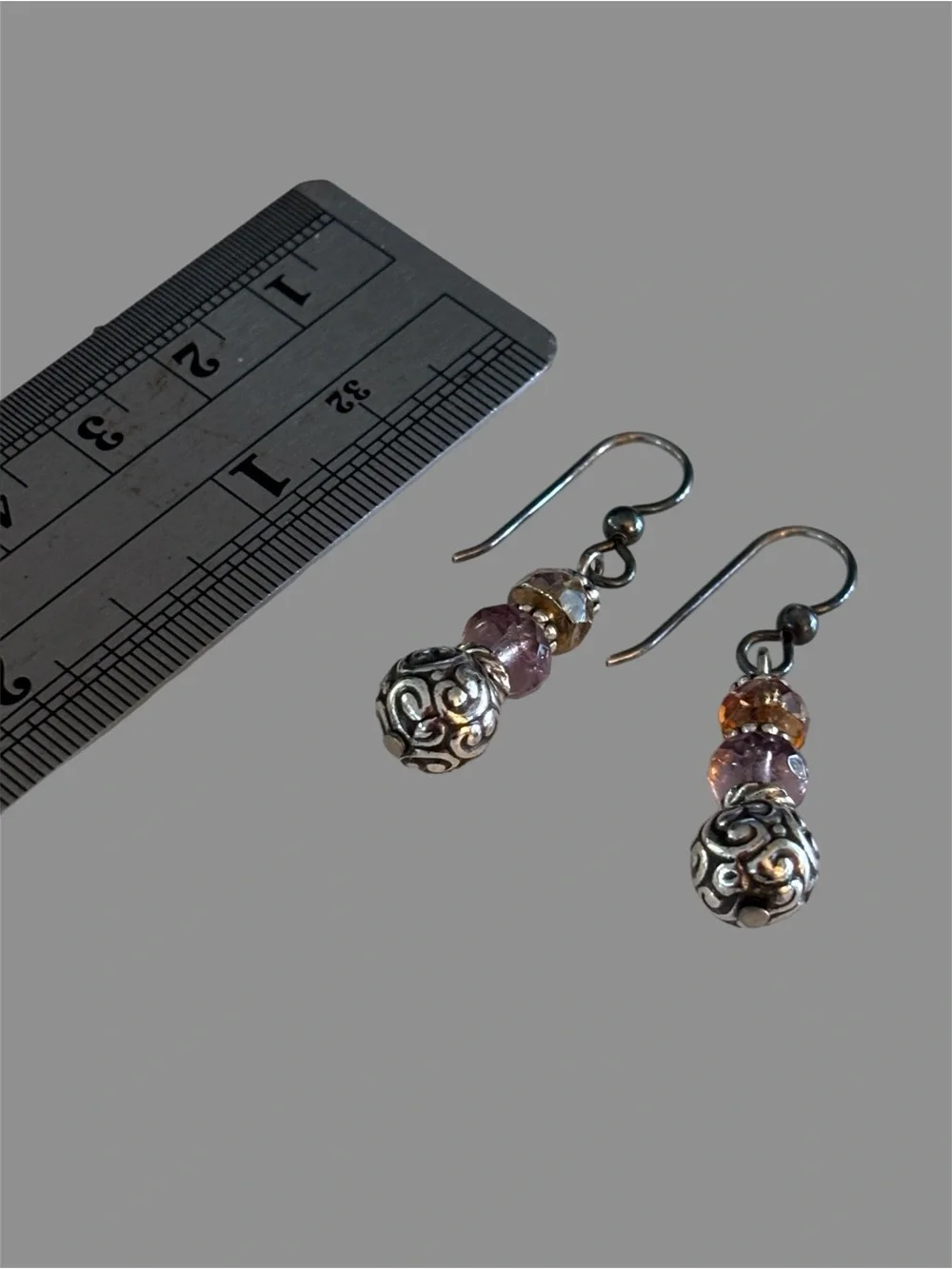 Brighton Kalpana dangle earrings featuring pink and amber beads.
